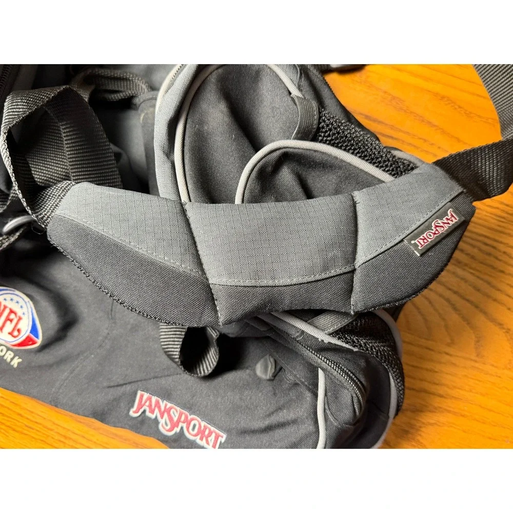 JanSport NFL Network 39L Duffel Bag-Black Canvas, Sports Gym w/Lock, Medium